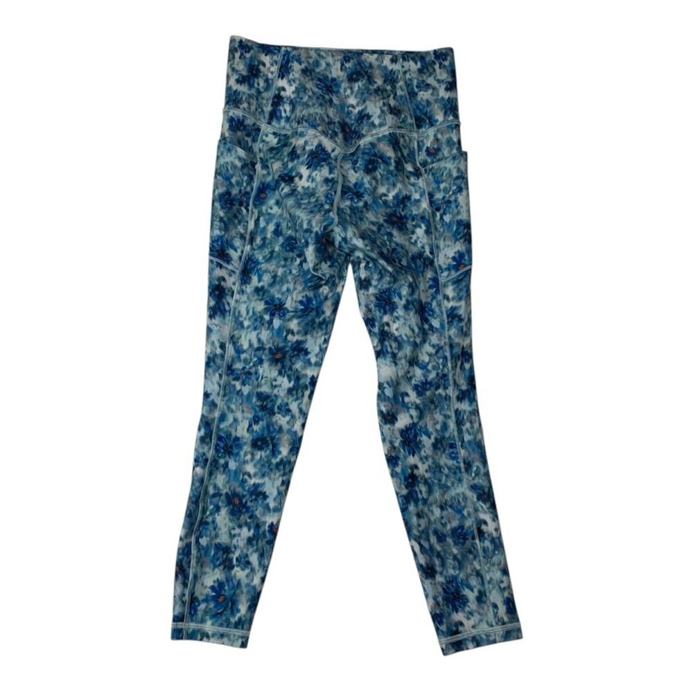 Athleta size small Salutation stash 7/8 tight Blue White printed Leggings pocket